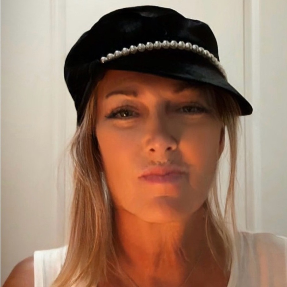Eugenia Kim “Sabrina” Cap. Black velvet with an ivory pearl band